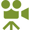 Das grüne Icon stellt symbolisch eine Filmkamera dar, sie steht für die Fullservice-Betreuung und Umsetzung der Dreharbeiten